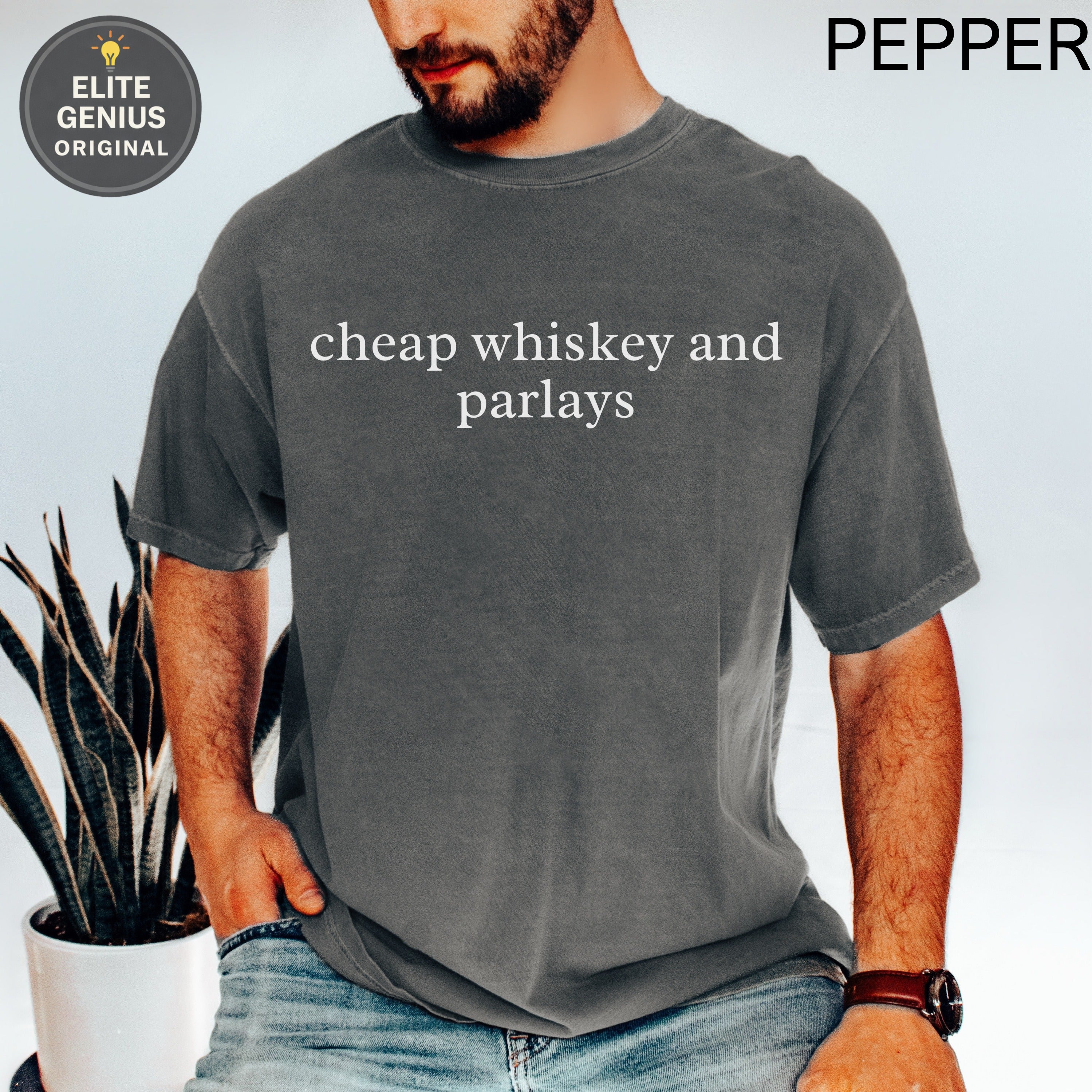 Dark grey t-shirt with "cheap whiskey and parlay's" printed in white.