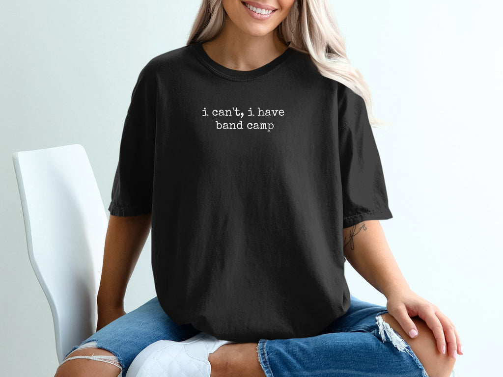 Black t-shirt with "I can't, I have band camp" text.