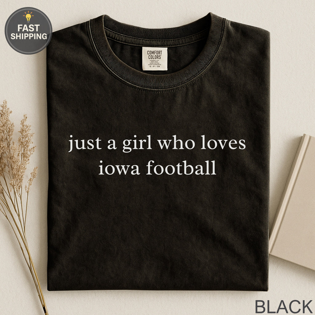 Black t-shirt with "just a girl who loves iowa football" text.