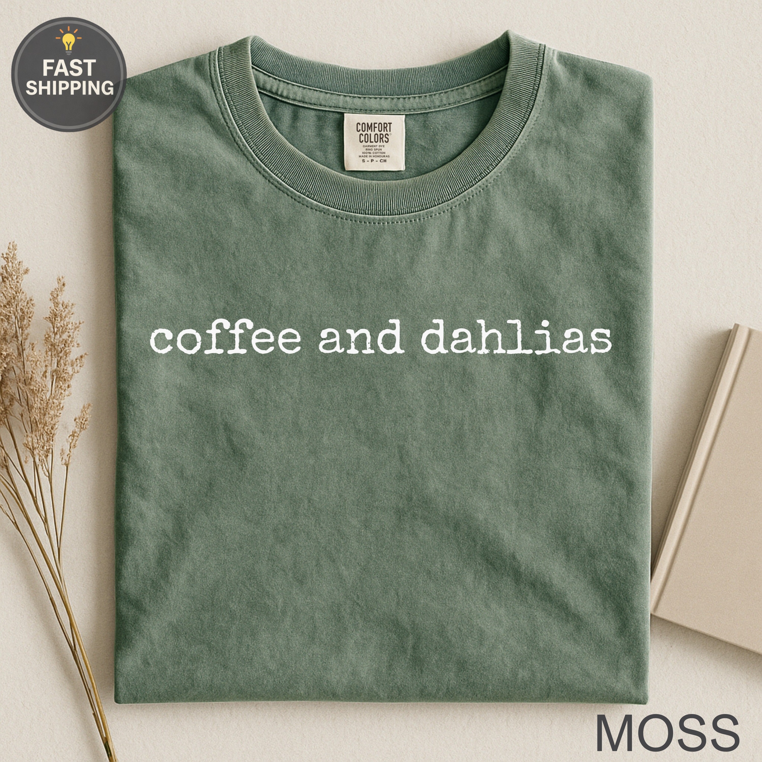 Green t-shirt with "coffee and dahlias" text and "MOSS" accent.