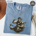 Blue Jean comfort shirt with graphic of a drummer playing drums.