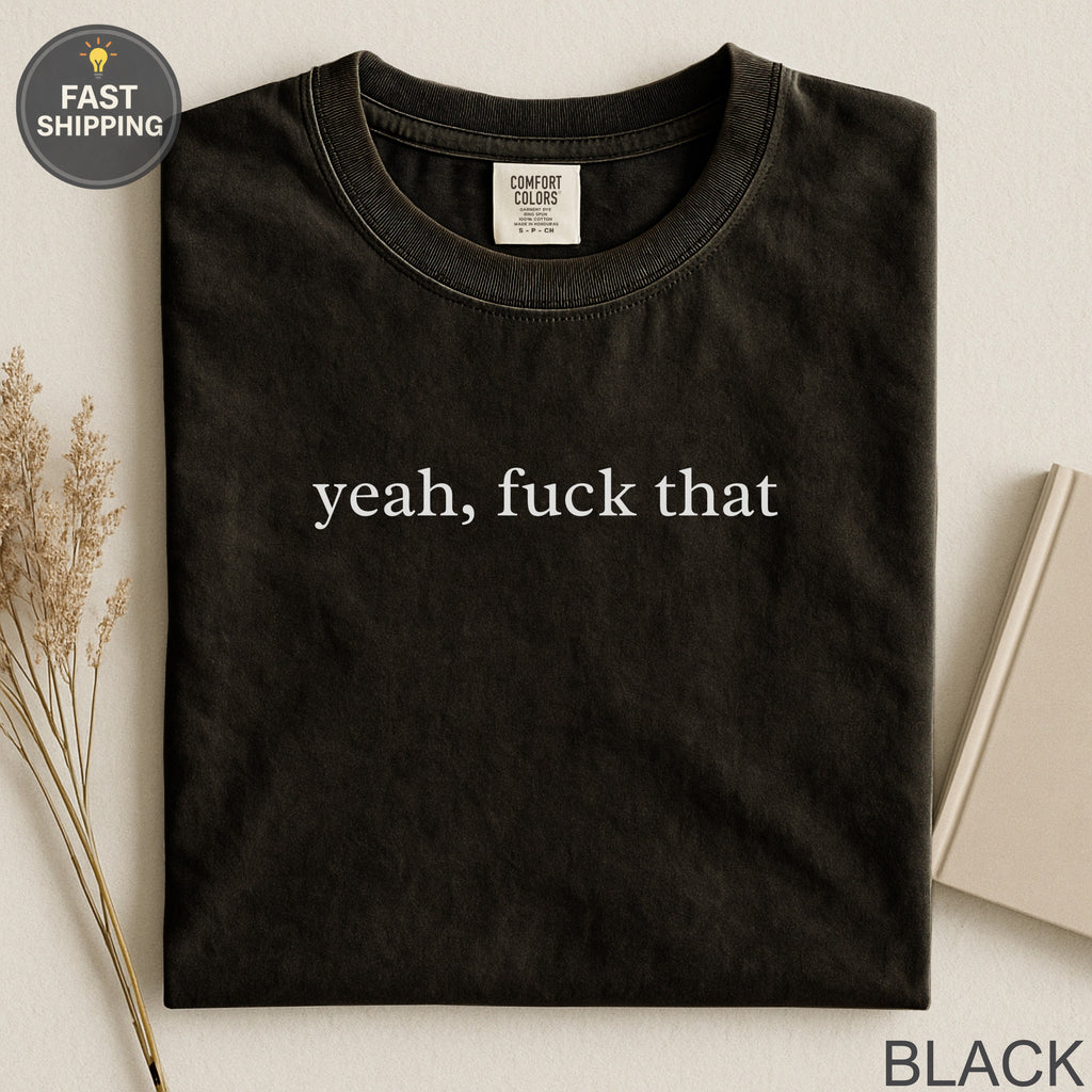 Black t-shirt with white text "yeah, fuck that" and "Fast Shipping" tag.