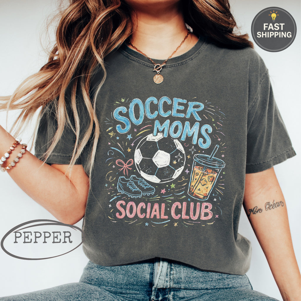 "Soccer Moms Social Club" graphic tee with soccer ball, drink, and sparkles.