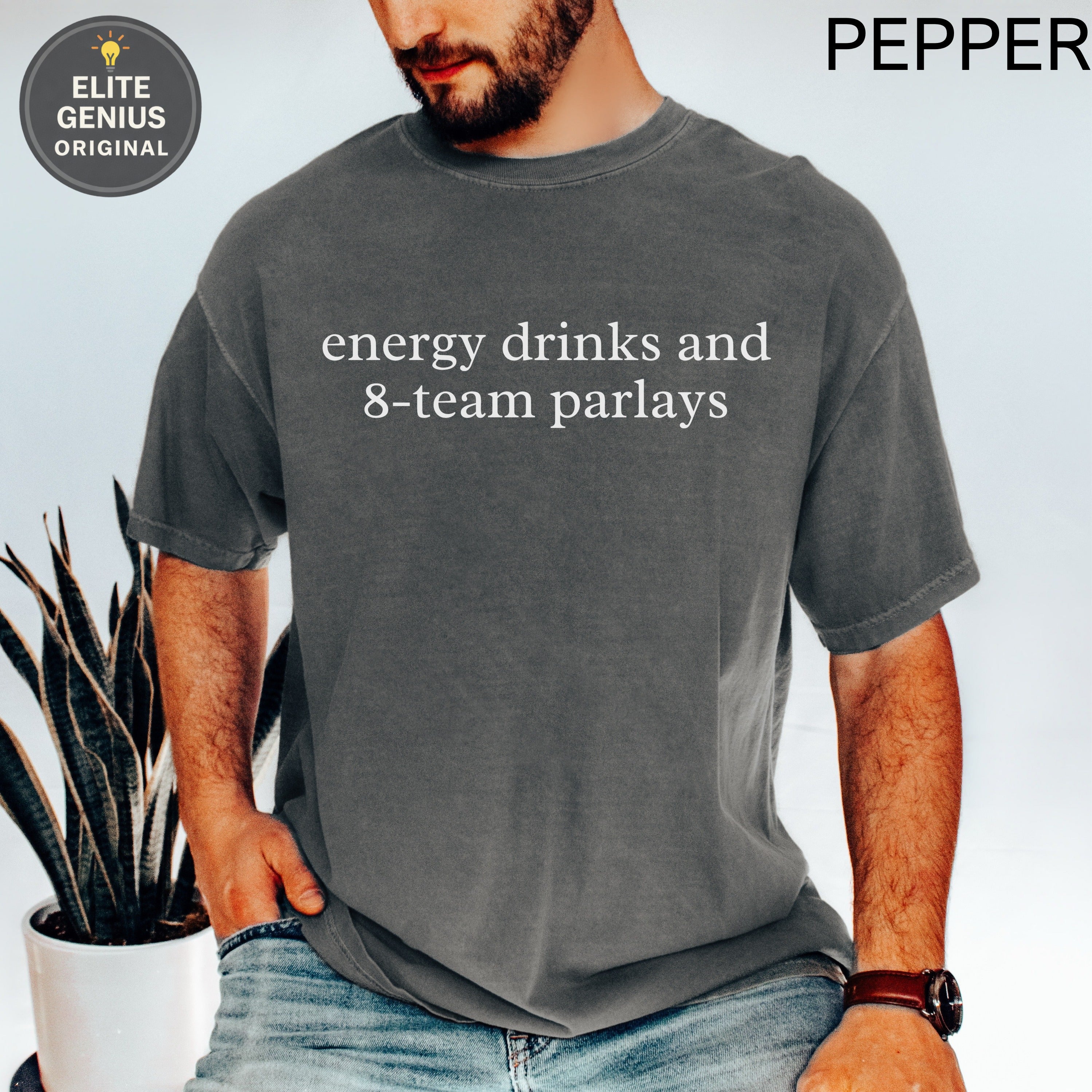 Dark grey t-shirt with white text "energy drinks and 8-team parlays" and "PEPPER".