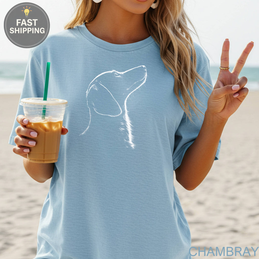 Light blue t-shirt with white outline drawing of a dog's head.