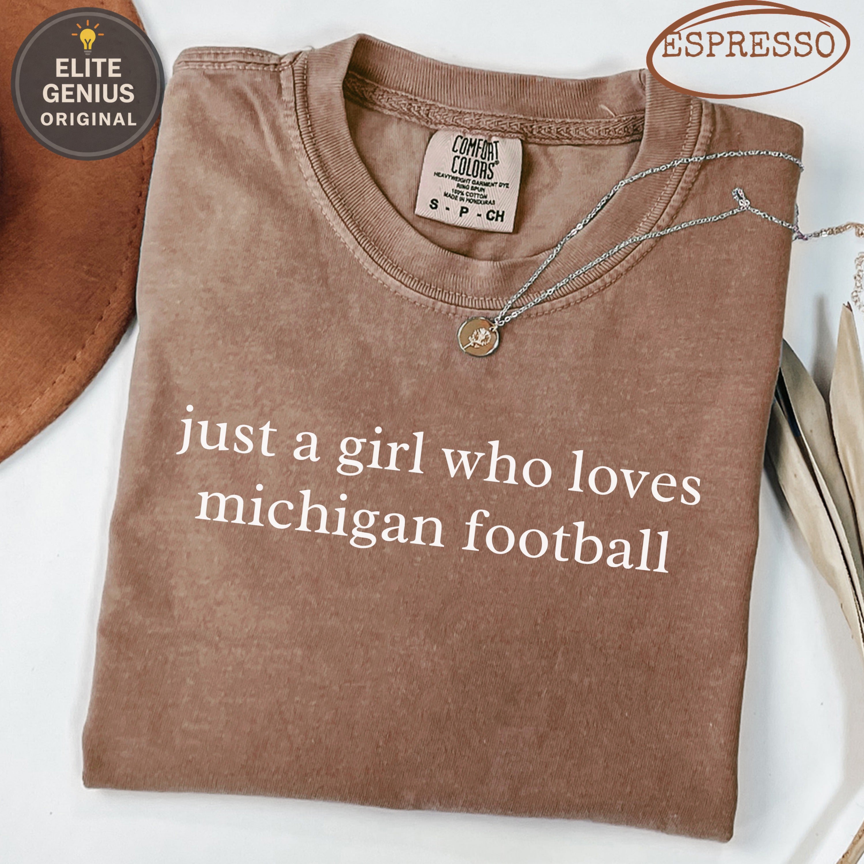 Comfort Colors t-shirt with "just a girl who loves michigan football" graphic.