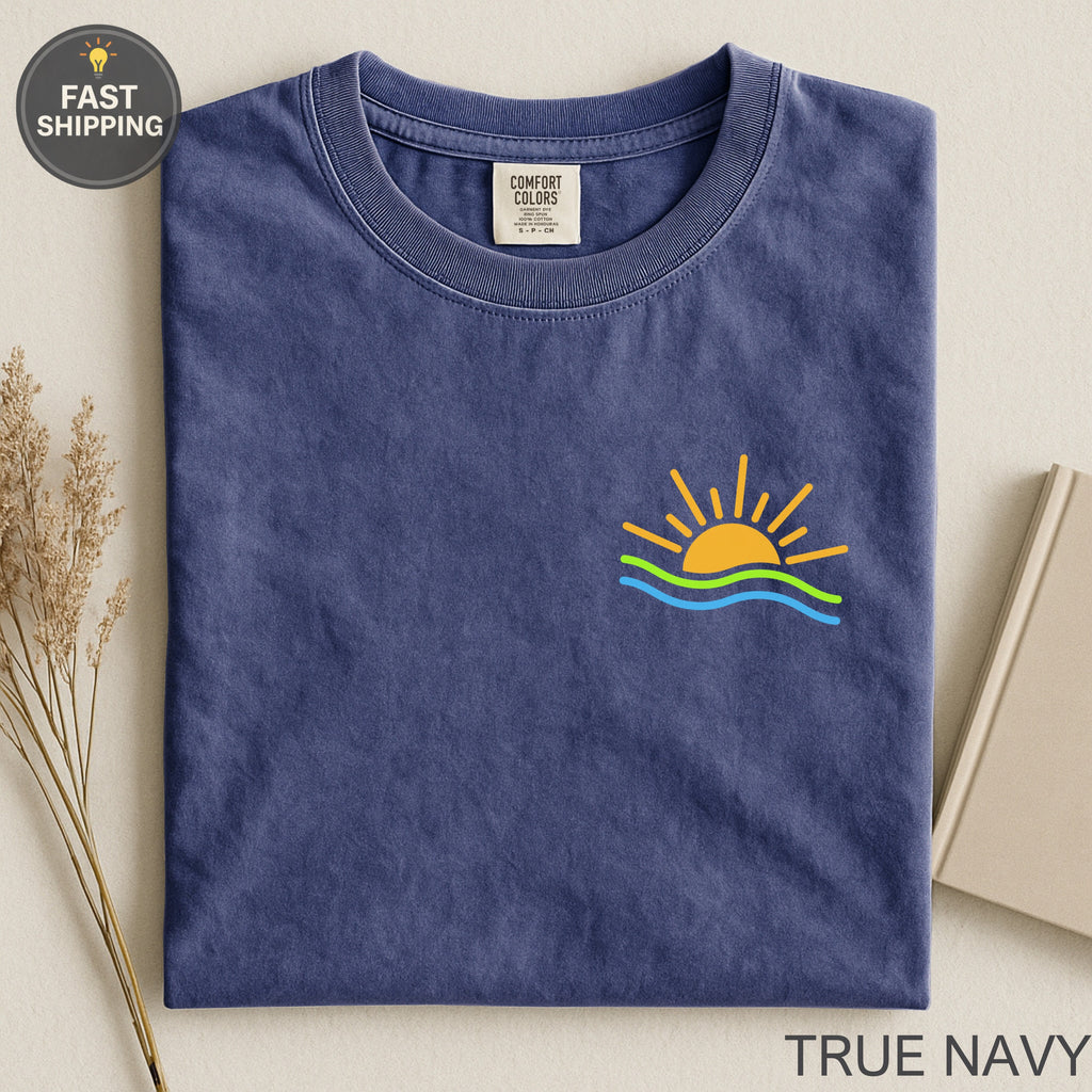 Navy blue t-shirt with sun and waves graphic and "True Navy" text.