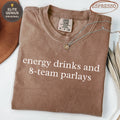 Brown t-shirt with "energy drinks and 8-team parlays" text and Comfort Colors label.