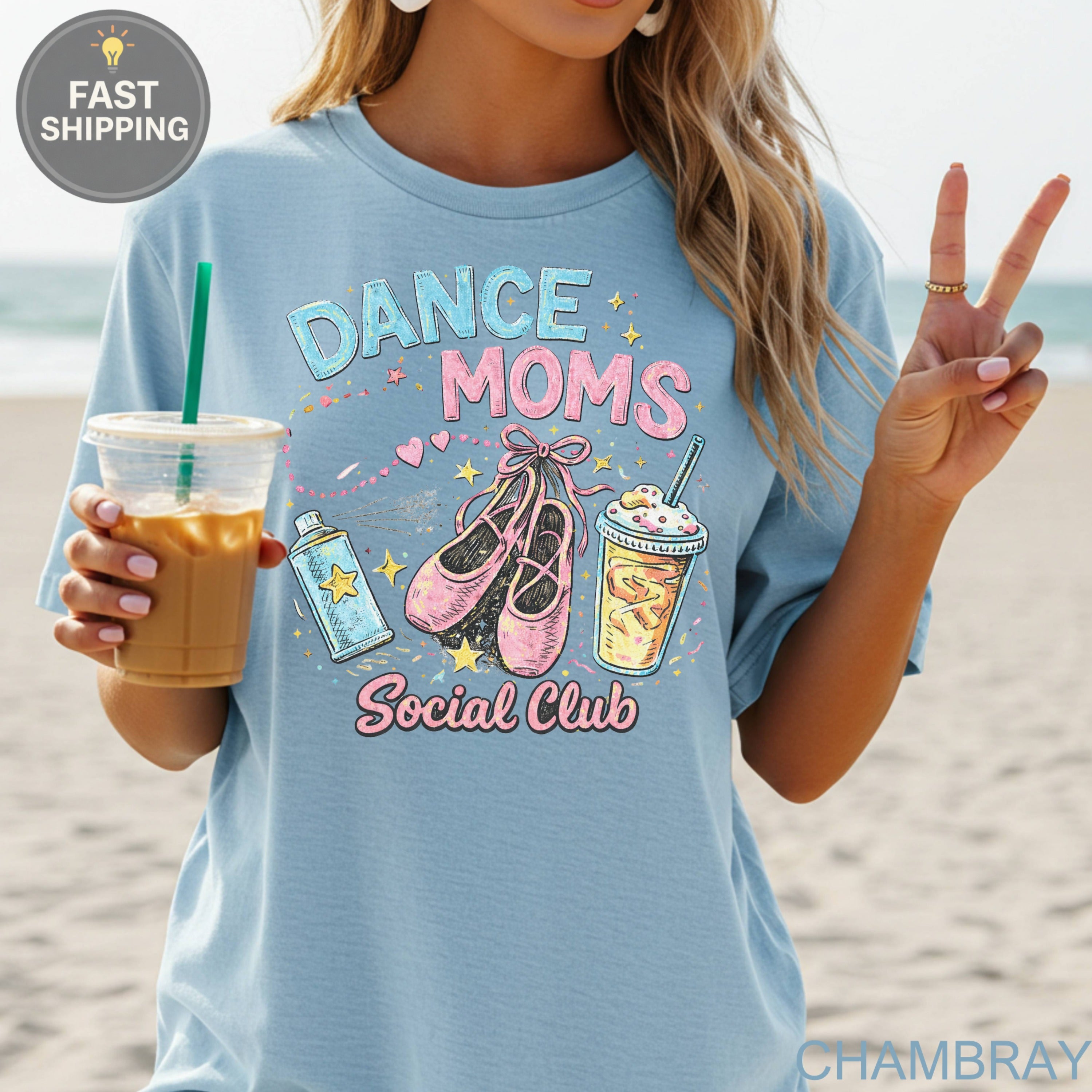 Light blue t-shirt with "Dance Moms Social Club" text and ballet shoes.