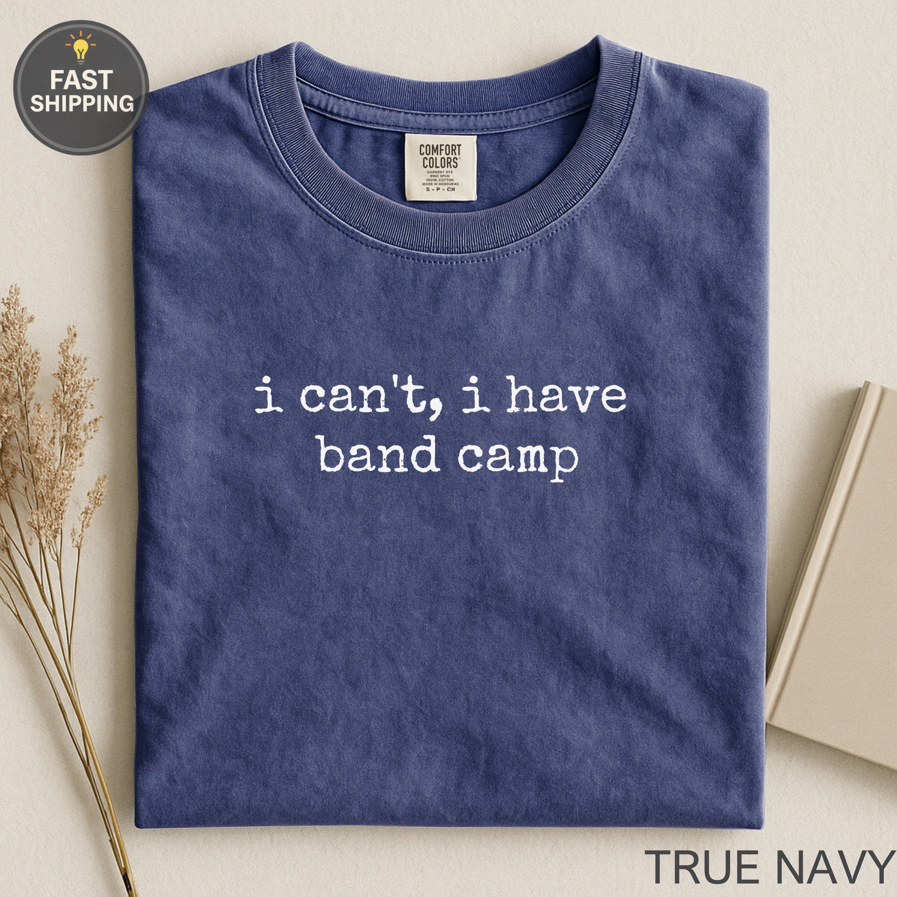 Navy t-shirt with "i can't, i have band camp" text.