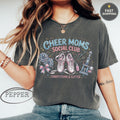 T-shirt with "Cheer Moms Social Club" and competition graphics.
