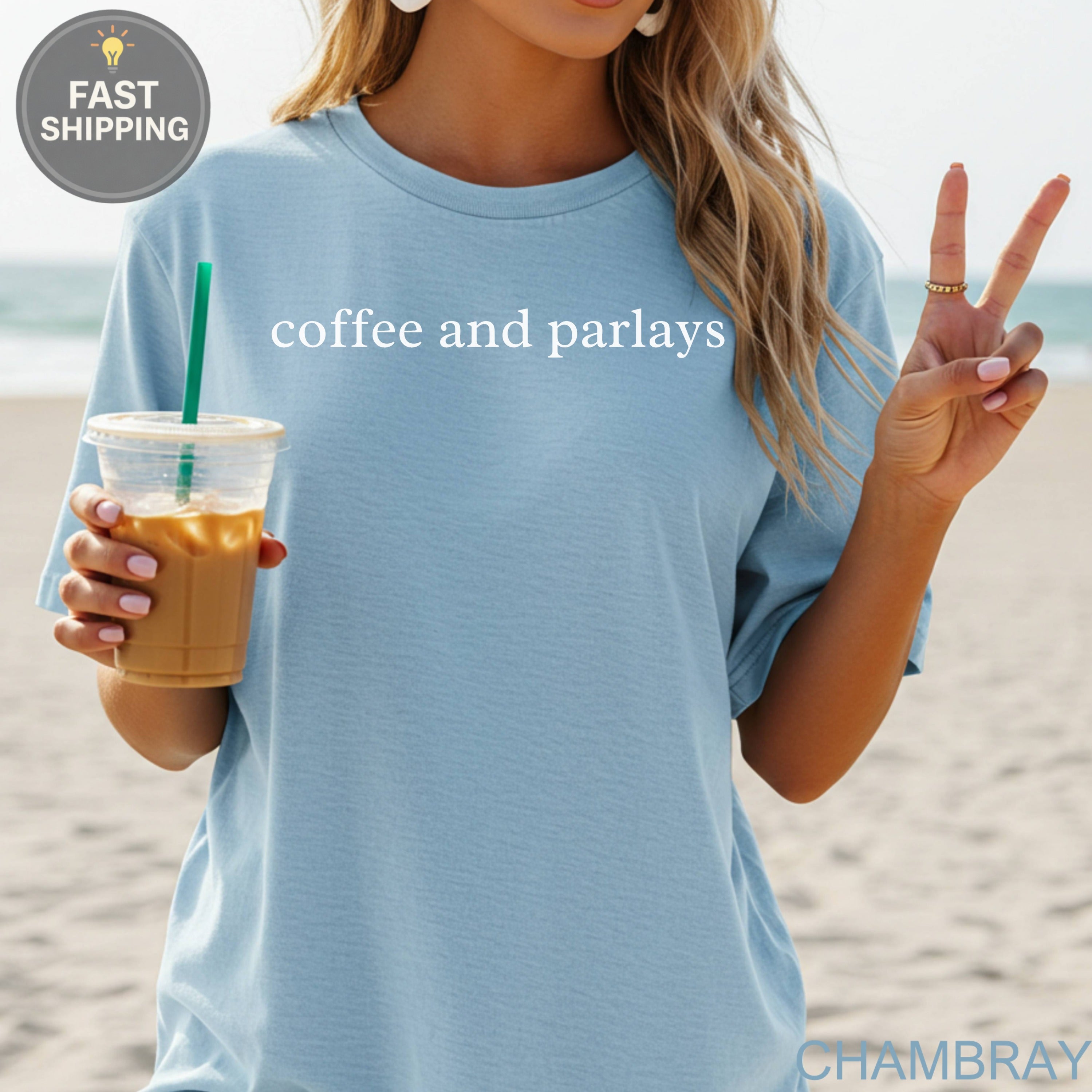 Light blue t-shirt with "coffee and parlays" text and a "Fast Shipping" tag.