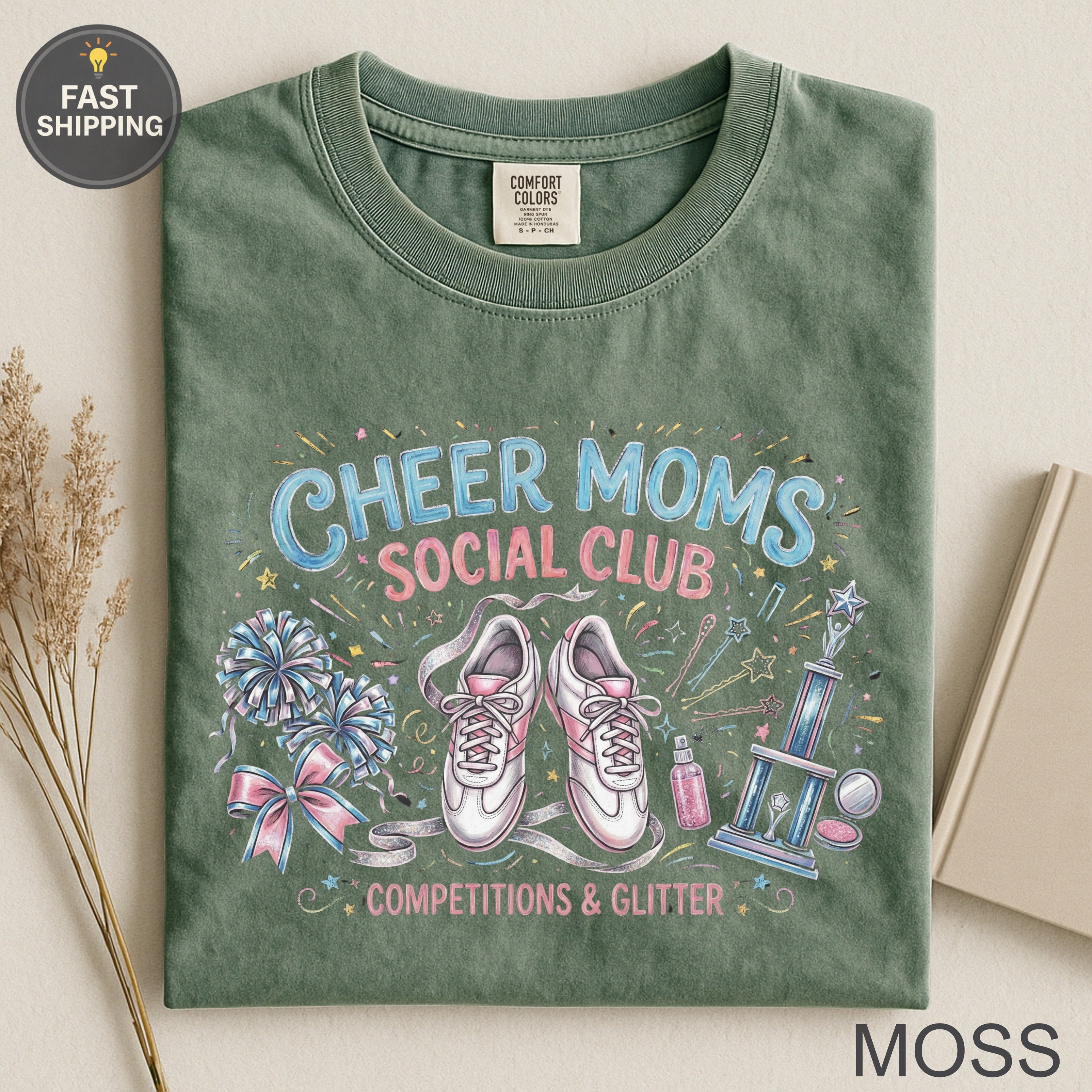 Green t-shirt with "Cheer Moms Social Club" text, sneakers, and trophy.