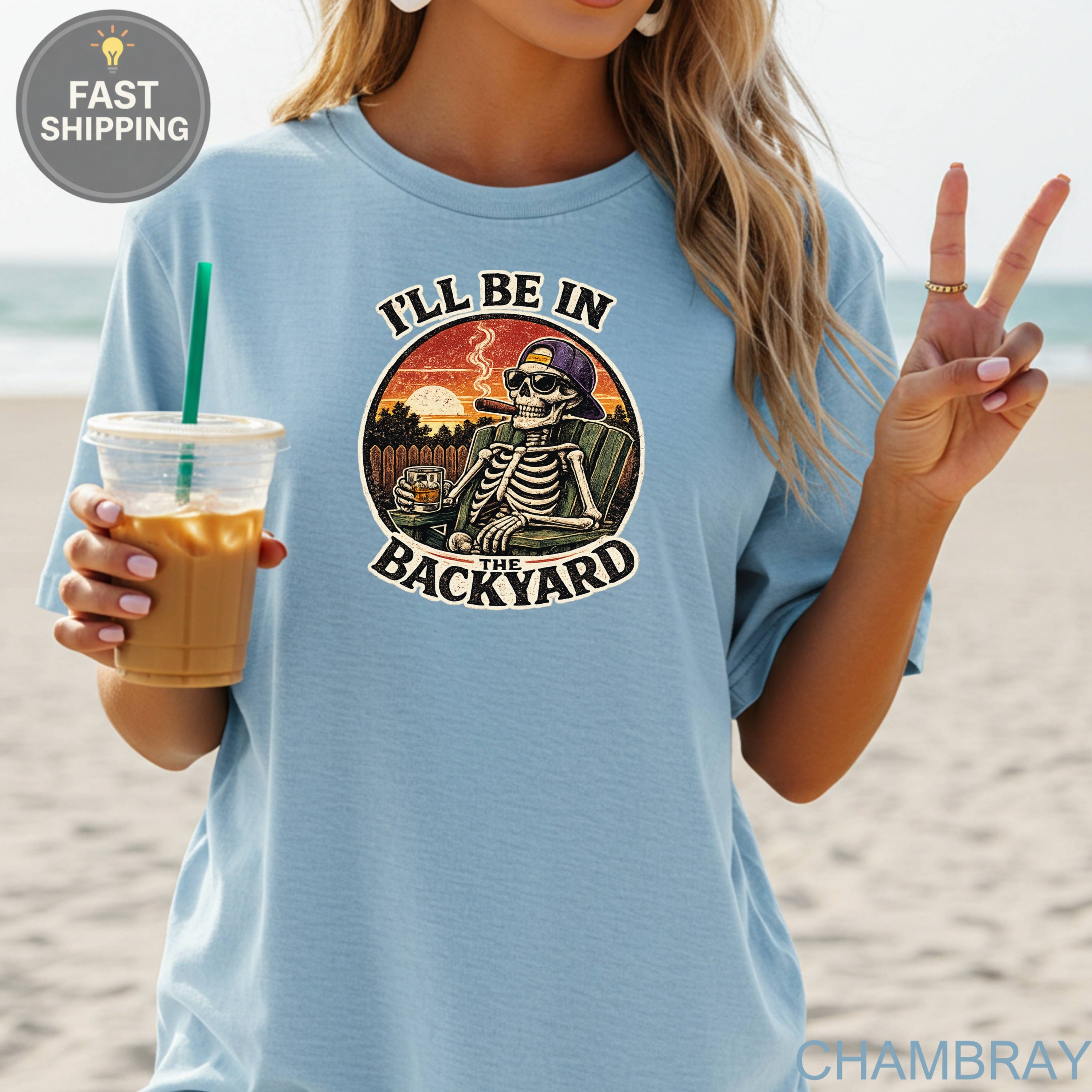 Skeleton relaxing in a chair with cigar and drink, "I'll be in the backyard" text.