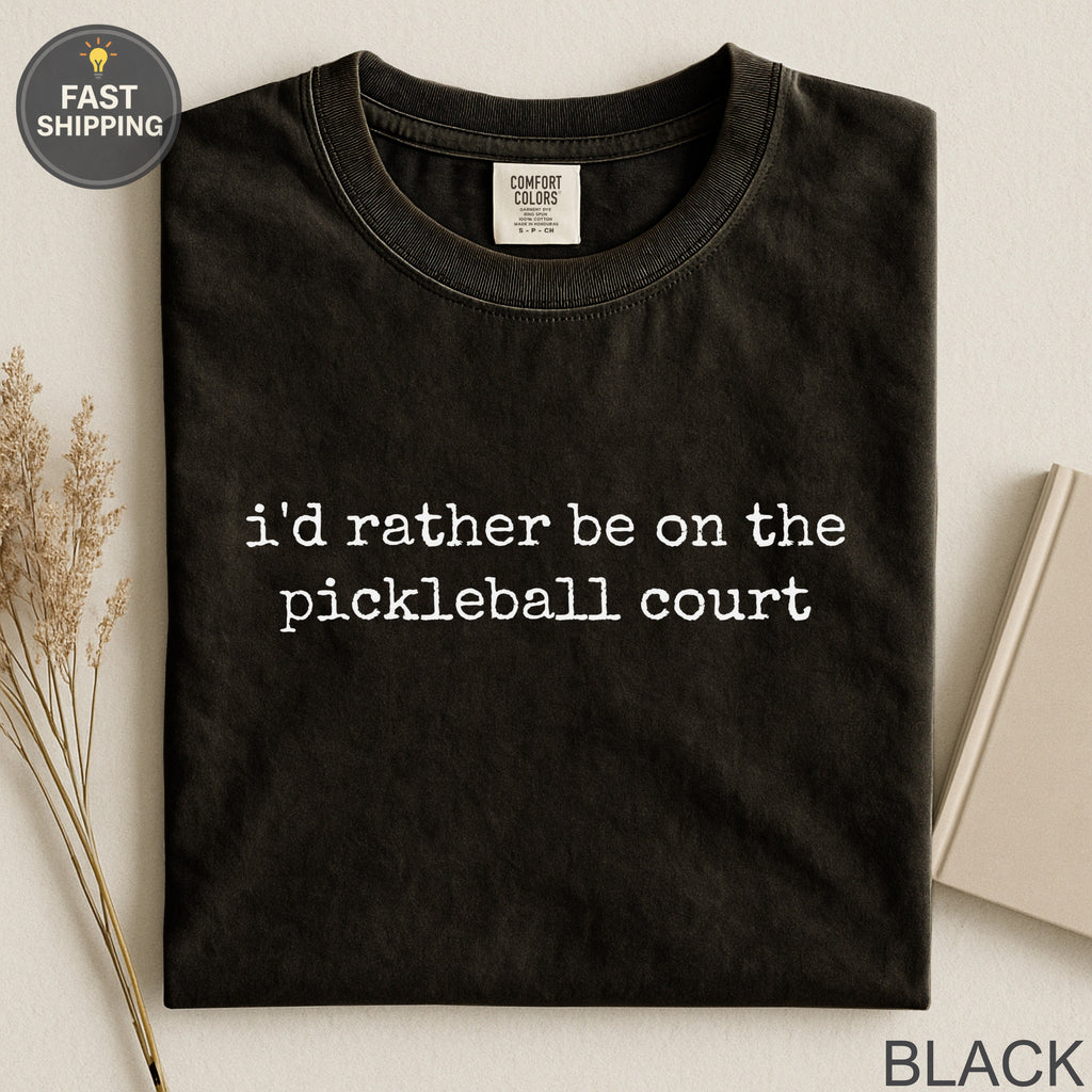 Black t-shirt with "i'd rather be on the pickleball court" text.