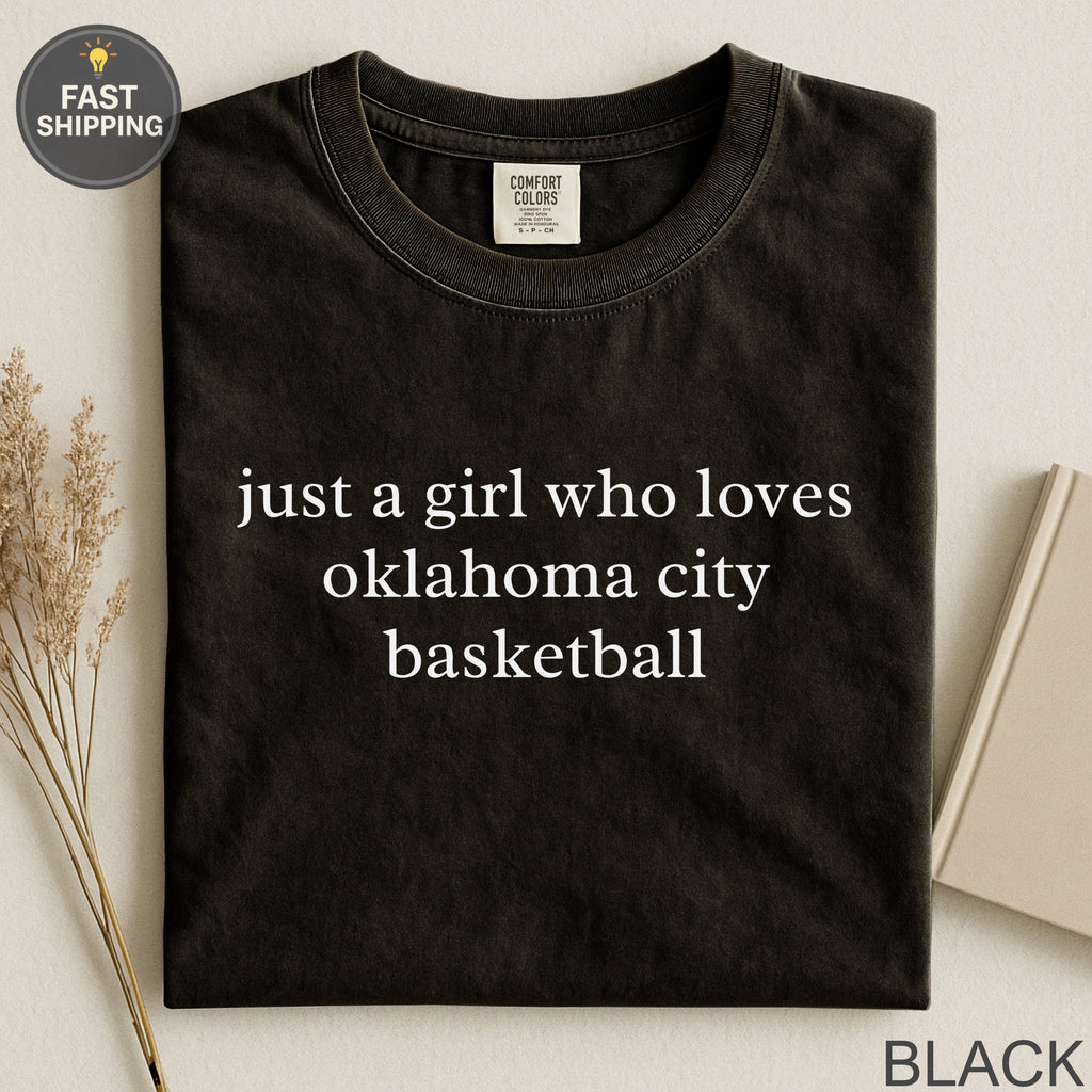 Black t-shirt with "just a girl who loves oklahoma city basketball" text.