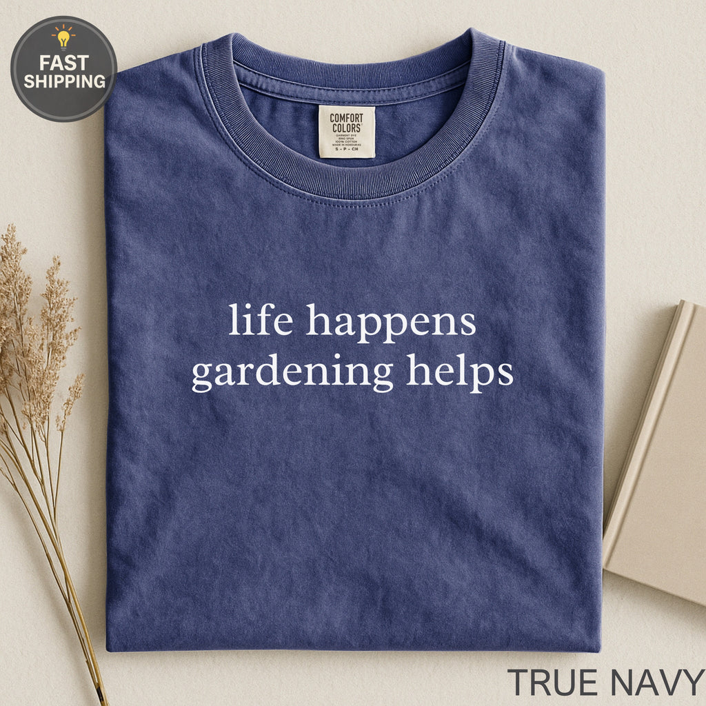 Navy blue t-shirt with "life happens gardening helps" text.