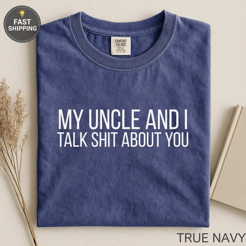 Navy blue t-shirt with white text "MY UNCLE AND I TALK SHIT ABOUT YOU".