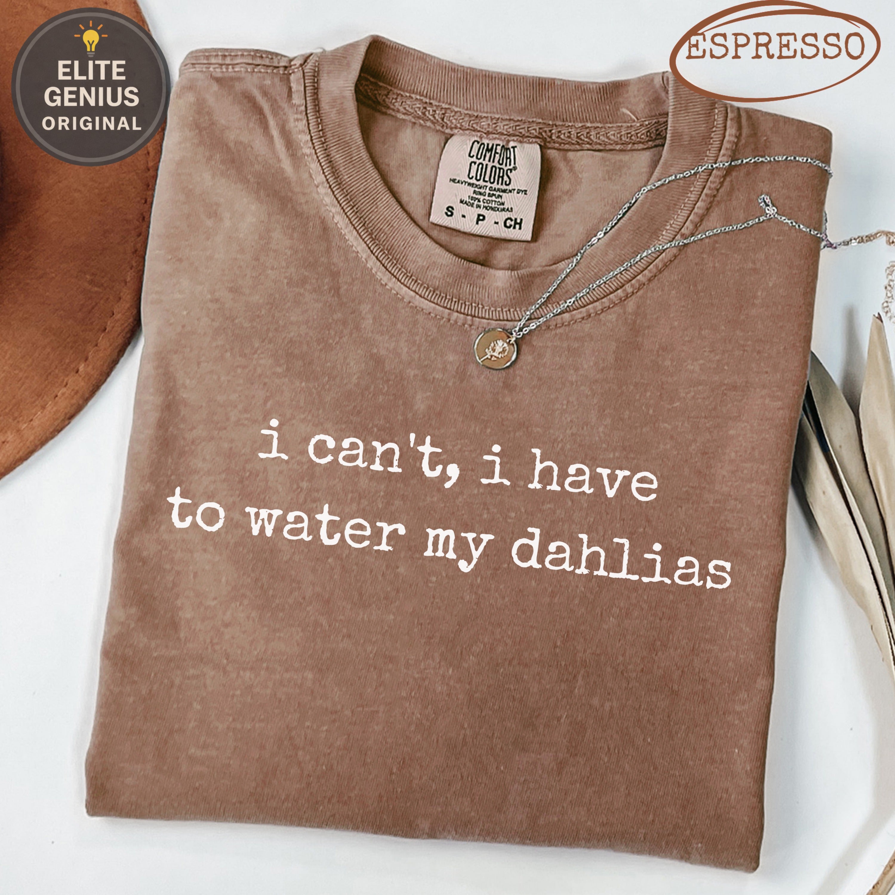 Brown t-shirt with "i can't, i have to water my dahlias" text.