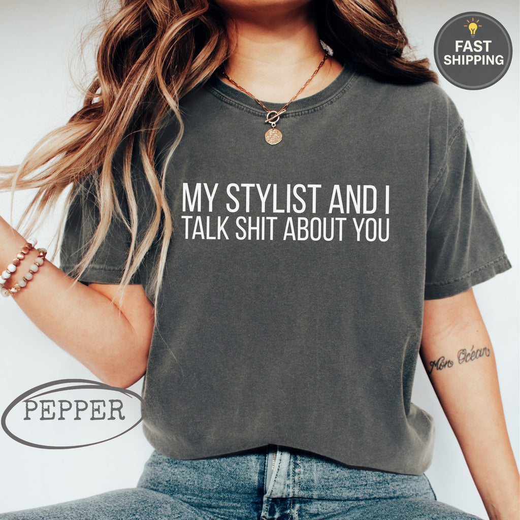 Charcoal t-shirt with white text: "MY STYLIST AND I TALK ABOUT YOU"