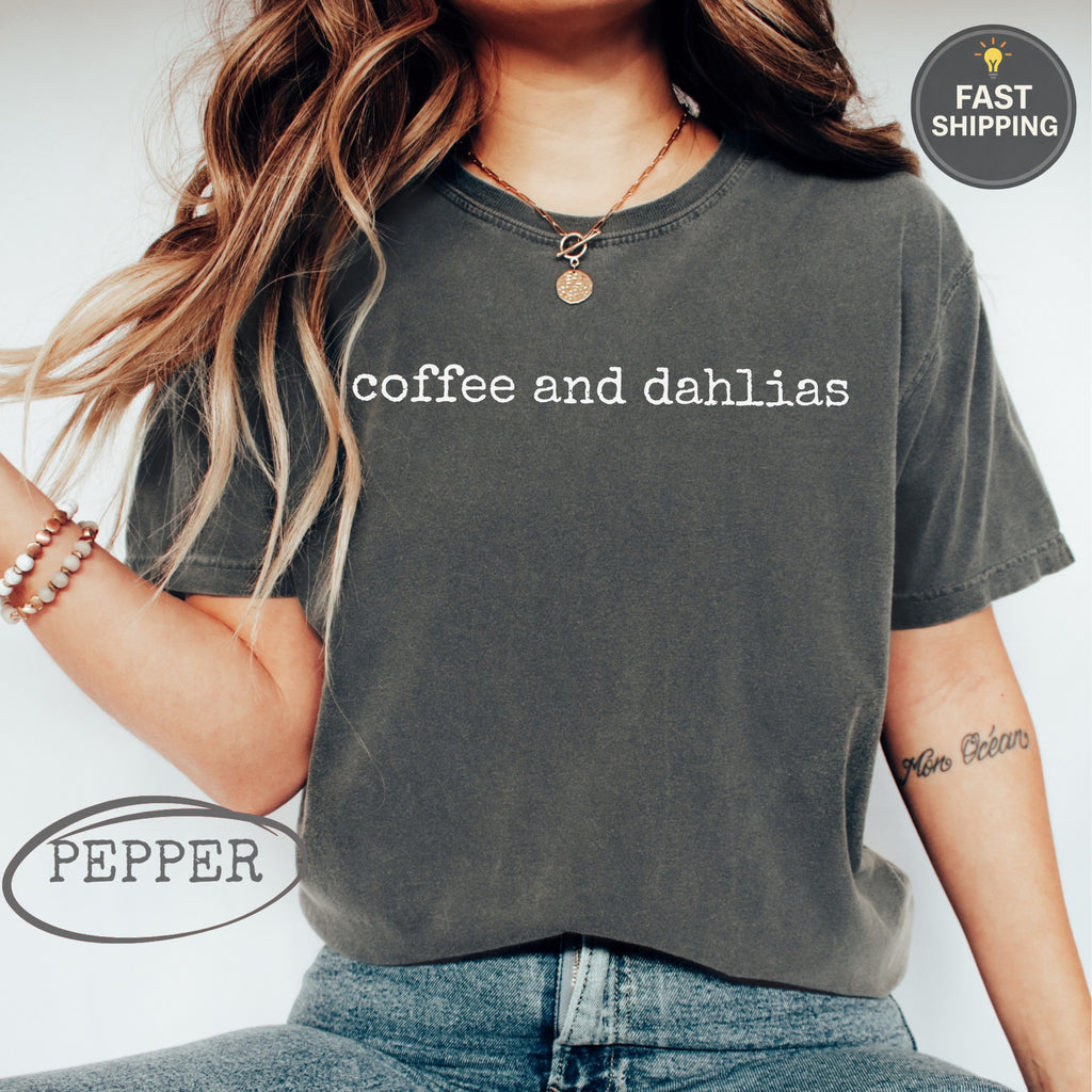Dark gray t-shirt with "coffee and dahlias" text and "Pepper" logo.