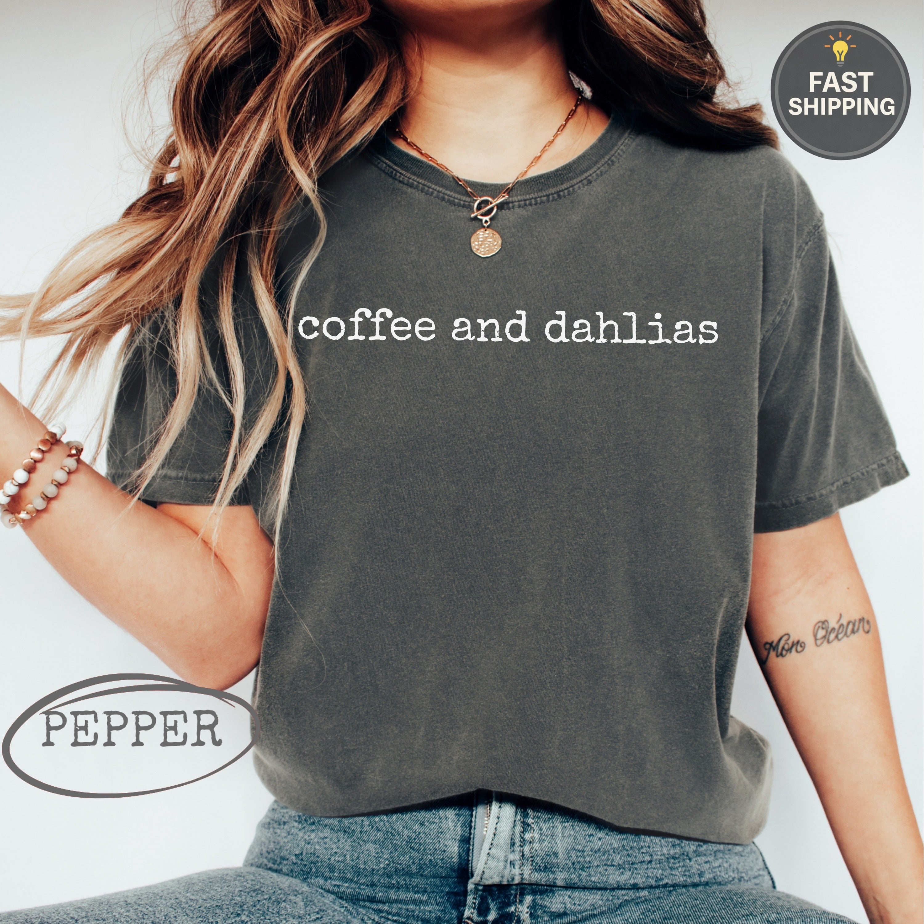 Dark gray t-shirt with "coffee and dahlias" text and "Pepper" logo.