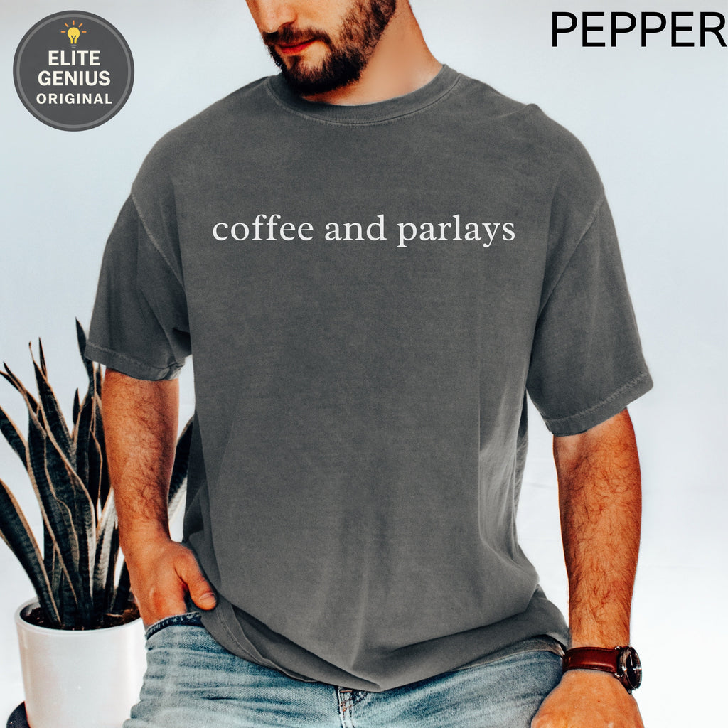 Gray t-shirt with "coffee and parlay" text, on a man.