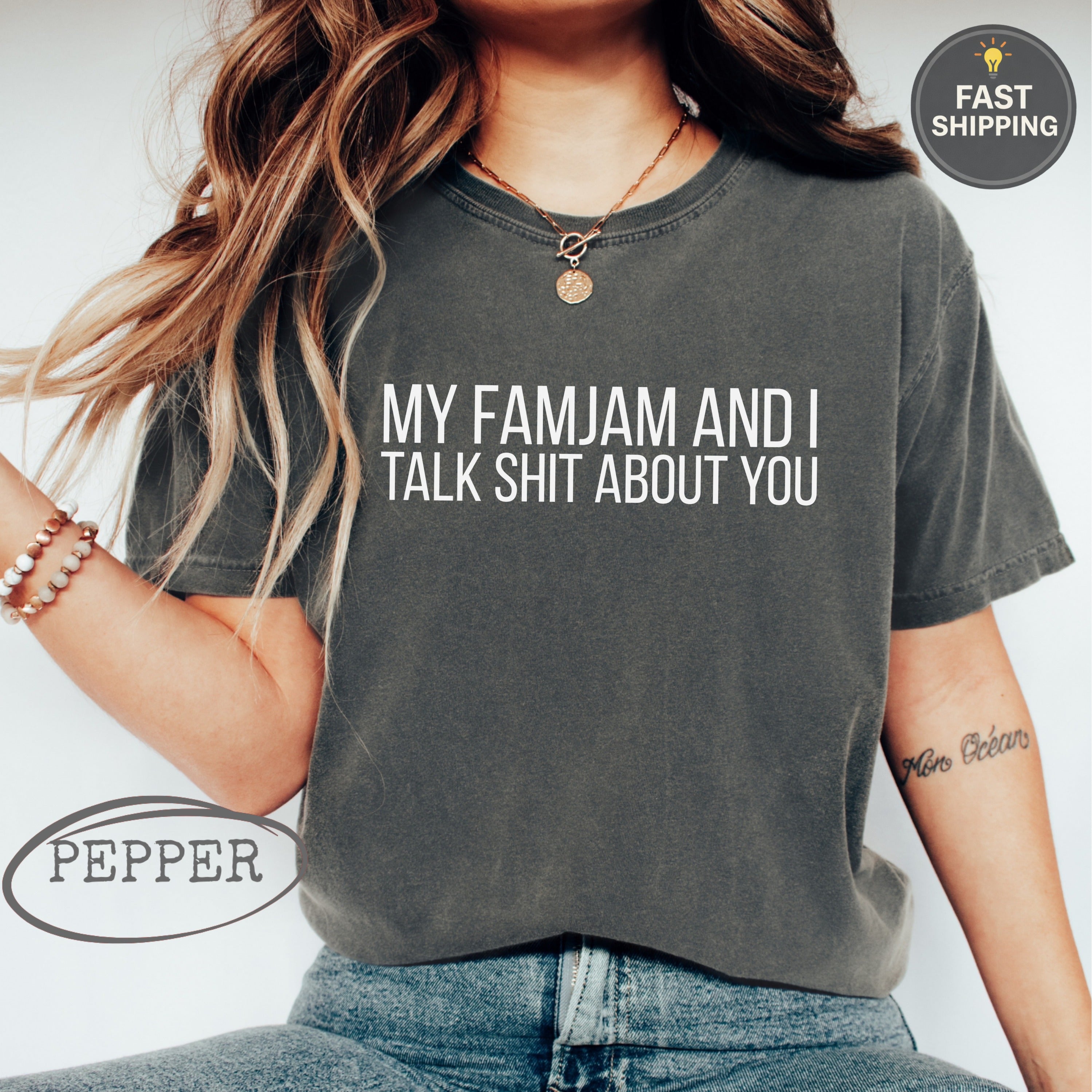 Dark grey t-shirt with "MY famJam AND I TALK SHIT ABOUT YOU" printed in white text.