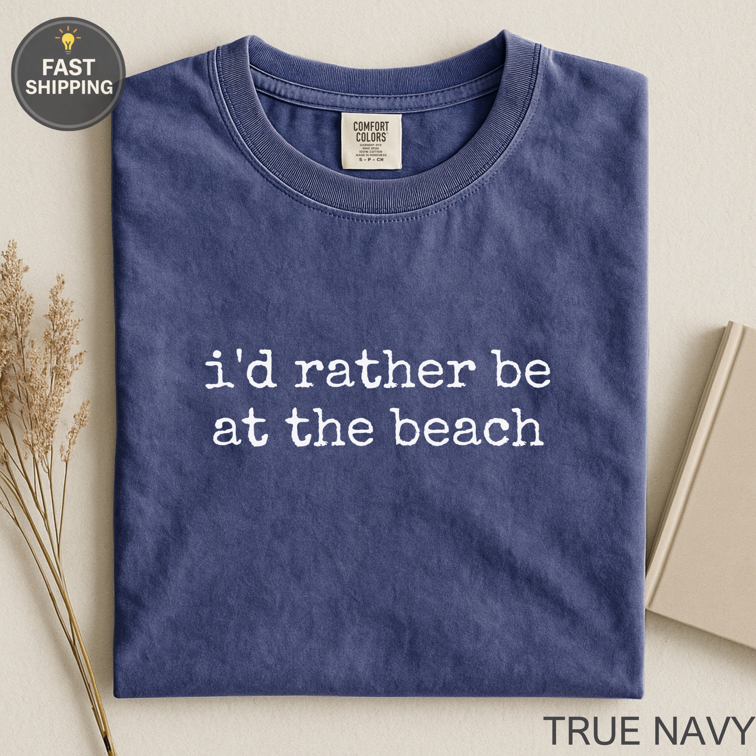 Navy Comfort Colors t-shirt with "i'd rather be at the beach" text.