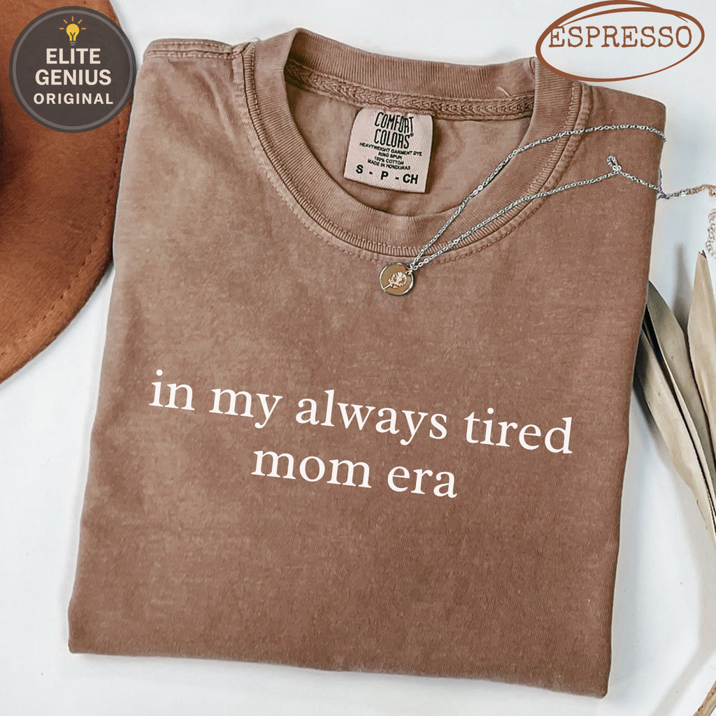 Brown t-shirt with "in my always tired mom era" text.