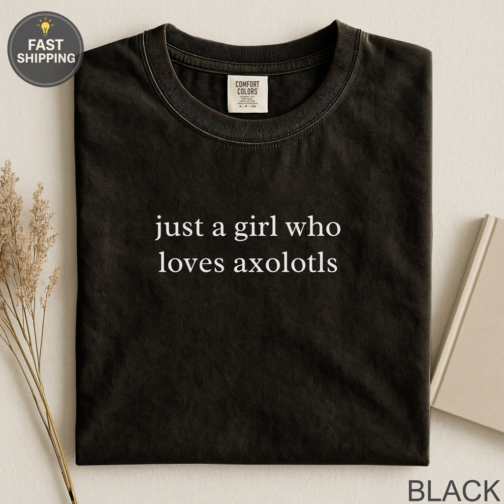 Black t-shirt with "just a girl who loves axolotls" printed in white.