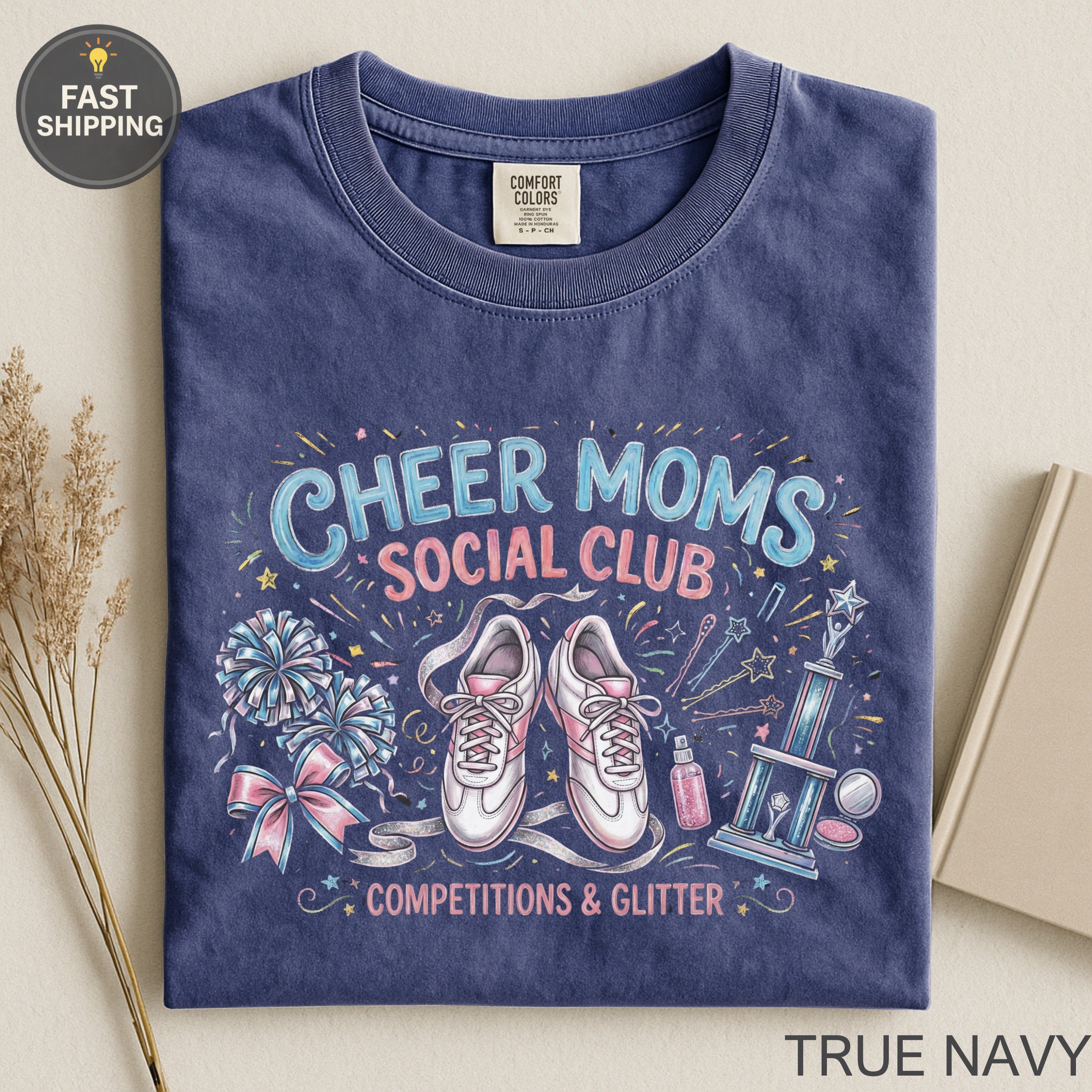 Navy t-shirt with "Cheer Moms Social Club Competitions & Glitter" design.