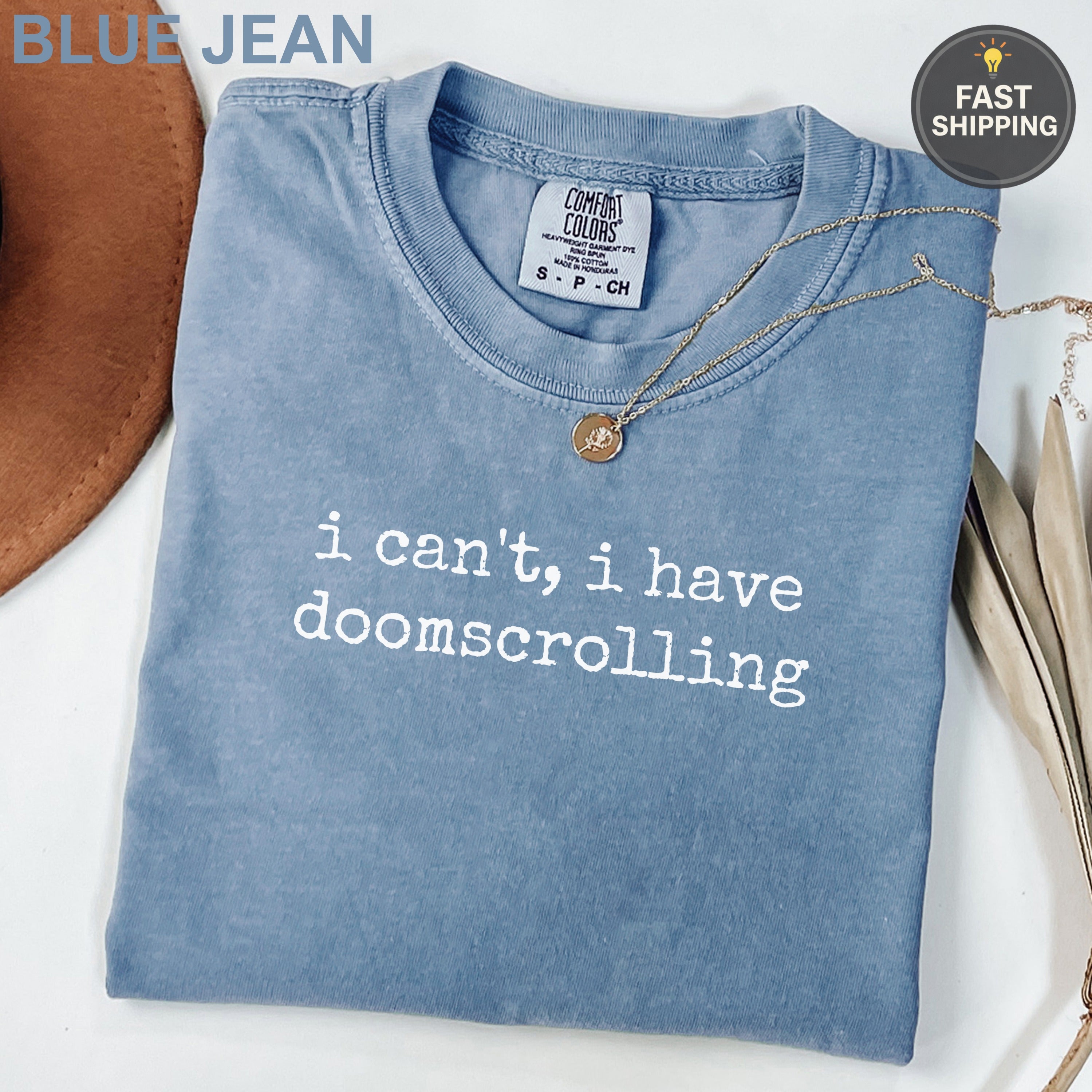 Comfort Colors blue t-shirt with "i can't, i have doomscrolling" text.