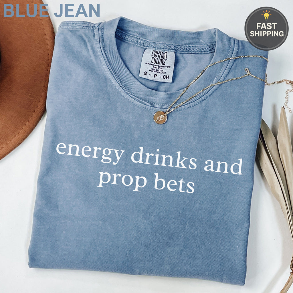 Blue Jean Comfort Colors t-shirt with "energy drinks and prop bets" text.