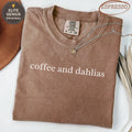 Brown t-shirt with "coffee and dahlias" graphic and Comfort Colors tag.