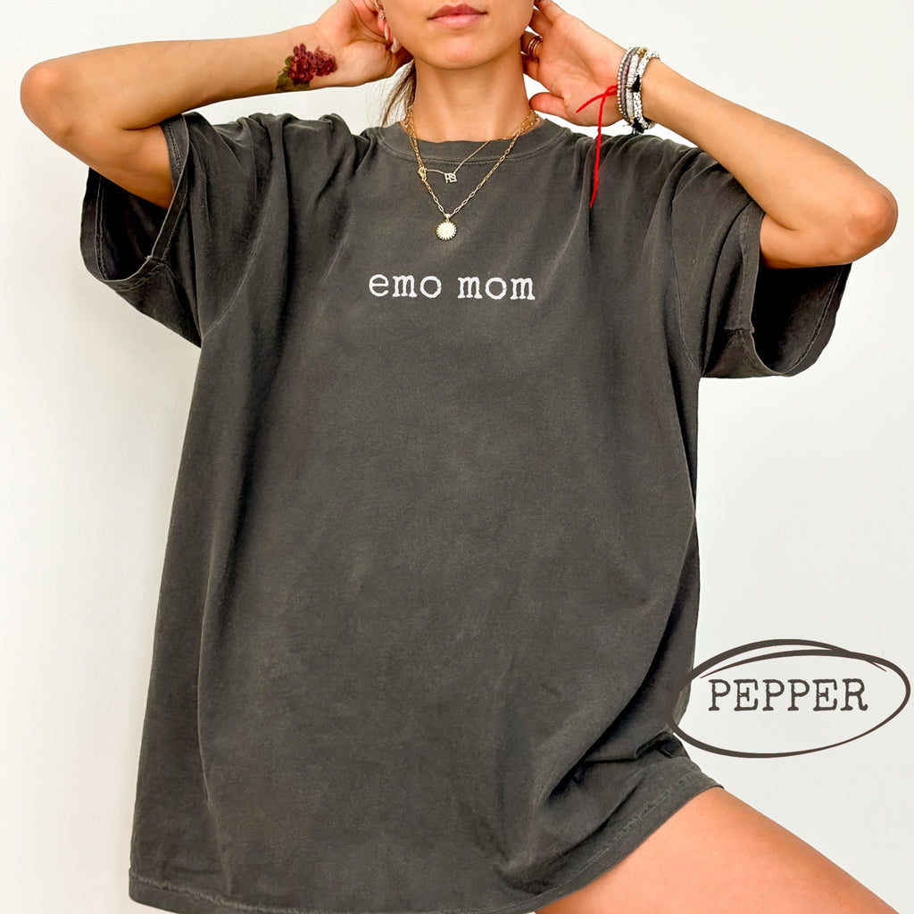 Dark grey t-shirt with "emo mom" text and a pepper logo.