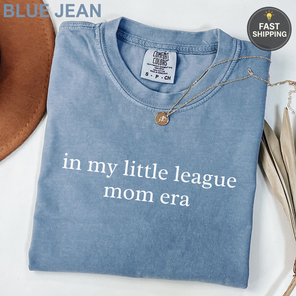 Blue Jean t-shirt with "in my little league mom era" text.